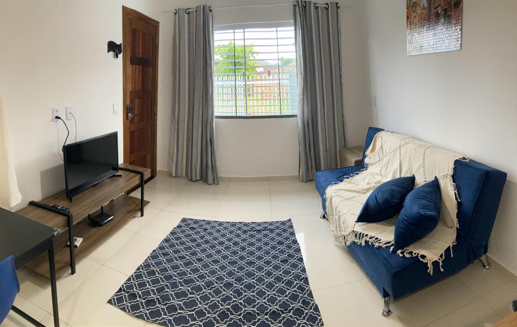 Sala da Casa Medeiros com a cortina aberta